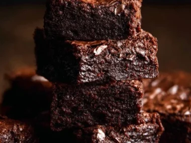 Delicious gooey brownies with a rich fudge texture and chocolate topping
