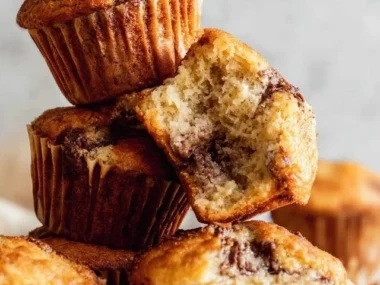 Freshly baked easy banana muffins on a cooling rack