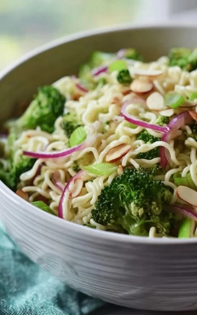 Colorful and fresh Ramen Noodle Salad topped with crunchy vegetables.