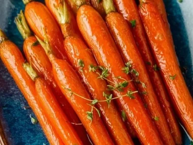 Three ingredient honey roasted carrots recipe on a serving plate