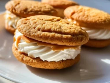 Delicious homemade Butterscotch Cream Sandwich Cookies arranged on a plate