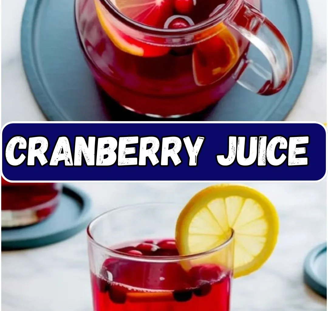 Homemade cranberry juice in a glass with fresh cranberries and mint leaves.