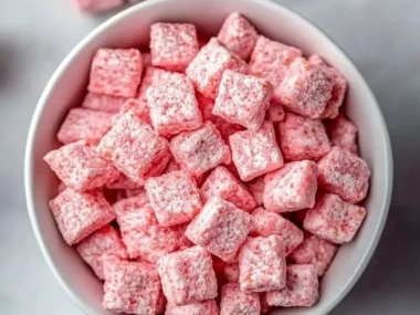 Easy strawberry shortcake puppy chow treats for pets and their owners.