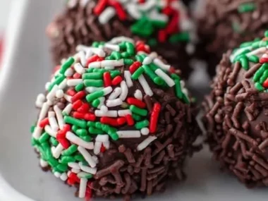 Delicious no-bake chocolate rum balls rolled in coconut and cocoa powder