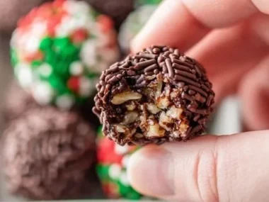 Delicious no bake chocolate rum balls ready to serve at a festive gathering.