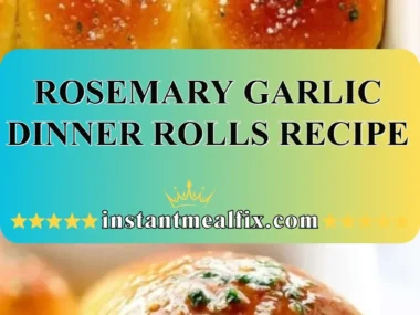 Freshly baked rosemary garlic dinner rolls on a wooden table
