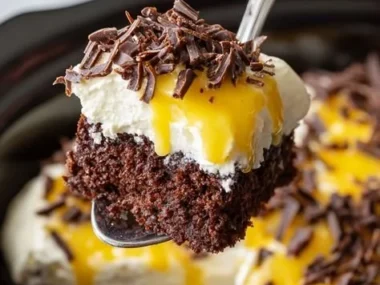 Delicious Slow Cooker Chocolate Caramel Cake topped with melted caramel