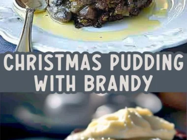 Delicious Christmas pudding served with rich brandy butter on top.