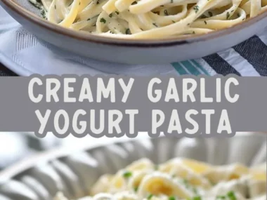 Plate of creamy garlic yogurt pasta topped with fresh herbs