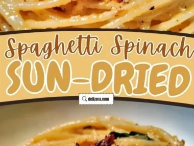 Creamy spaghetti with spinach and sun-dried tomatoes in a bowl