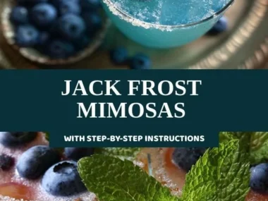 A refreshing Jack Frost Mimosa cocktail served in a glass with winter-themed decorations.