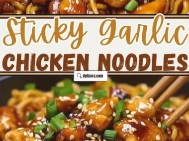 Plate of sticky garlic chicken noodles garnished with herbs.