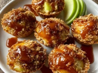 Caramel apple crisp bites topped with warm caramel sauce and crunchy topping