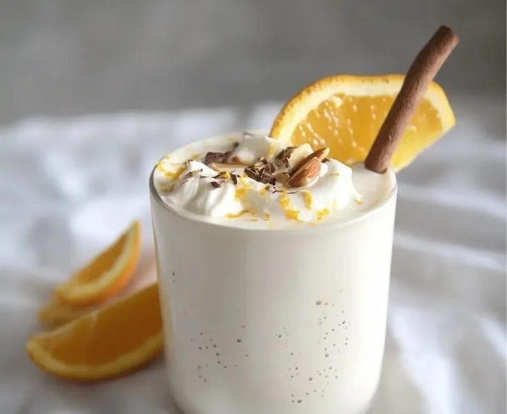 Creamy white chocolate orange almond cocoa in a cozy winter setting
