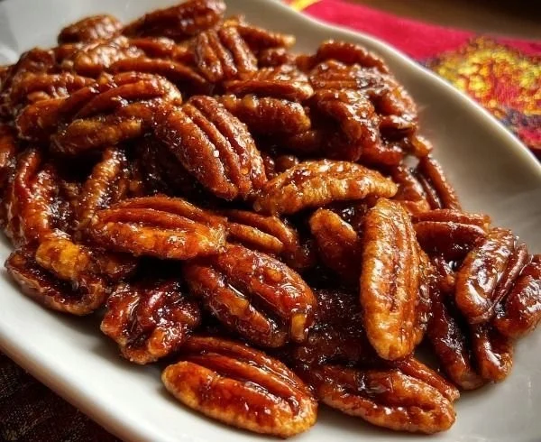 Delicious Crockpot Fireball Whisky Candied Pecans in a serving bowl