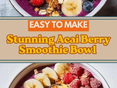 Delicious acai berry smoothie bowl topped with fresh fruits and nuts.