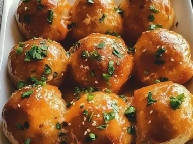 Air Fryer Buffalo Chicken Bombs cooked to golden perfection with spicy sauce