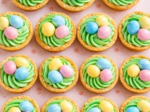 Easter Basket Sugar Cookie Cups decorated with colorful icing and candy.