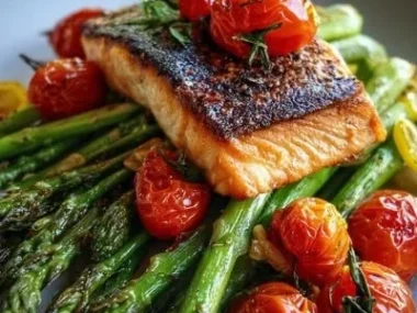 A colorful plate of healthy spring dinner recipes featuring fresh vegetables and herbs.