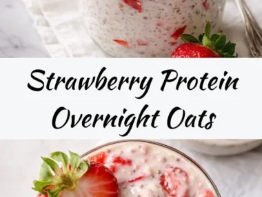 Bowl of healthy strawberry protein overnight oats topped with fresh strawberries