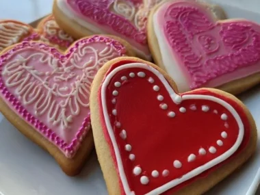 Freshly baked heart-shaped cookies decorated for Valentine's Day