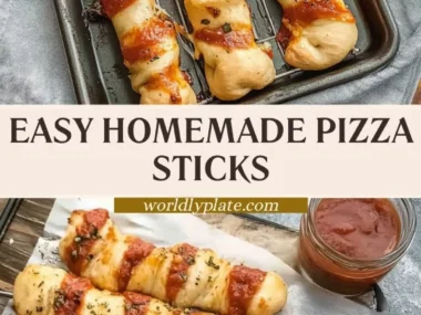 Plate of homemade pizza sticks topped with cheese and herbs