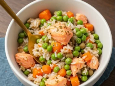 A bowl of Salmon & Brown Rice Dog Food for healthy canine nutrition.