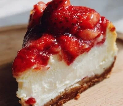 Delicious strawberries and cream layer cheesecake ready to wow your guests