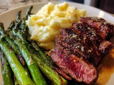 Romantic Valentine's Day dinner setup with candles and elegant table settings.