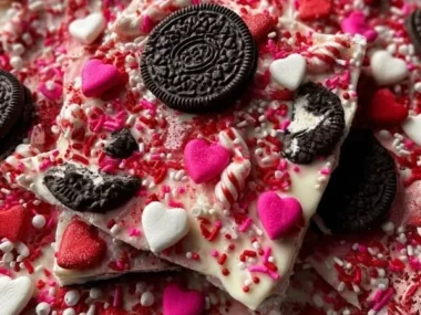 No-bake Valentine's Day Oreo Cookie Bark topped with heart-shaped sprinkles.