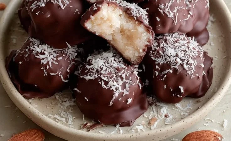 Almond Joy Coconut Bites with coconut, almond, and chocolate layers
