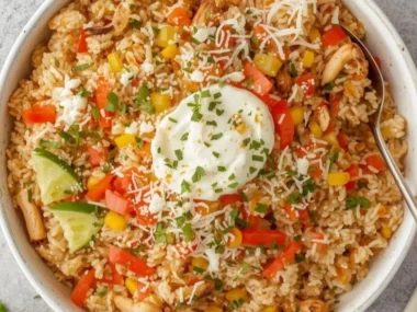 Delicious Cheesy Chicken Taco Rice served in a vibrant bowl