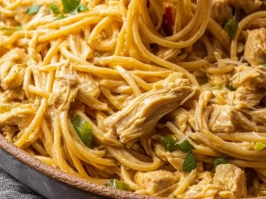 Delicious Chicken Spaghetti served on a plate with garnish