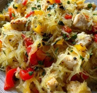 Delicious Chicken Spaghetti Squash served with fresh herbs