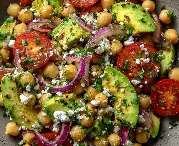 Chickpea Feta Avocado Salad with fresh vegetables and herbs