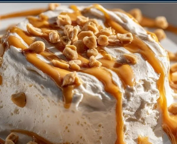 Cottage Cheese Peanut Butter Mousse dessert in a bowl with toppings