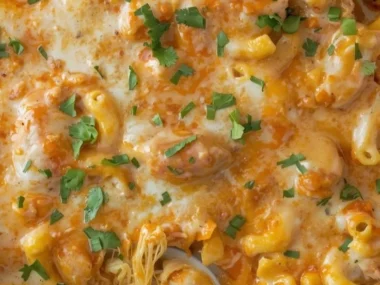 Creamy Buffalo Chicken Mac & Cheese Bake in a casserole dish