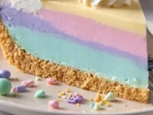 Colorful Fruit Jello Pie topped with fresh fruits and whipped cream