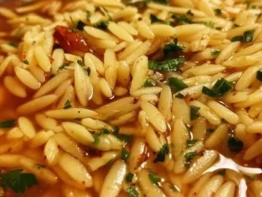 Bowl of Greek Manestra showcasing its rich flavor and ingredients