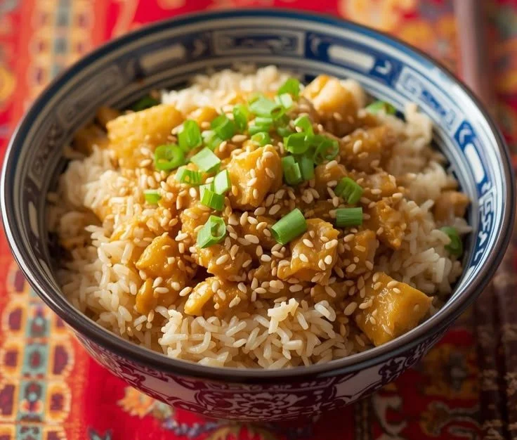 Delicious high protein Asian chicken fried rice served in a bowl