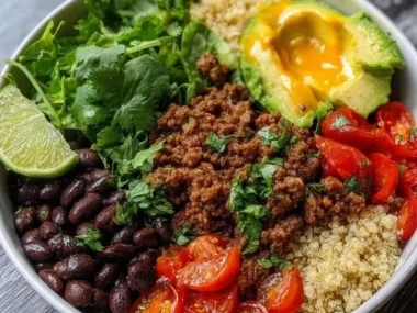 High protein ground beef power bowls with fresh vegetables and grains