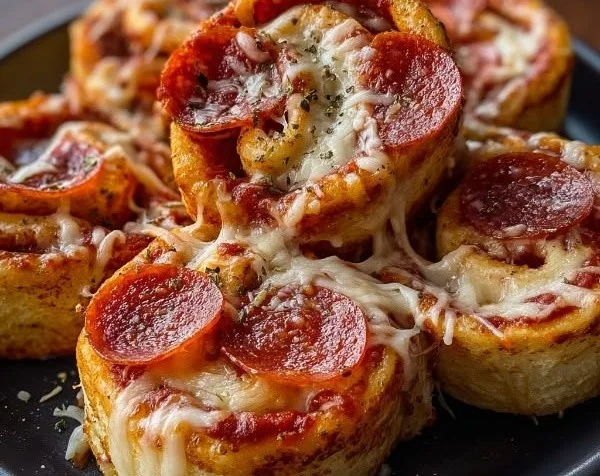 High protein pepperoni pizza rolls served on a plate, ready to enjoy.