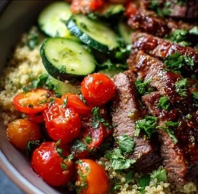 Mediterranean steak bowl with grilled meat and fresh vegetables