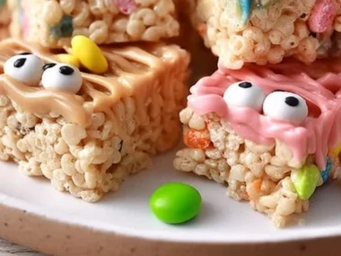 Colorful Monster Rice Krispie Treats decorated for Halloween