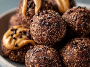 No-bake chocolate peanut butter protein balls recipe in a bowl.