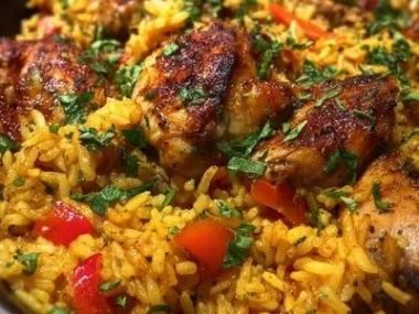 One pan Mediterranean chicken and rice dish with vibrant vegetables and herbs
