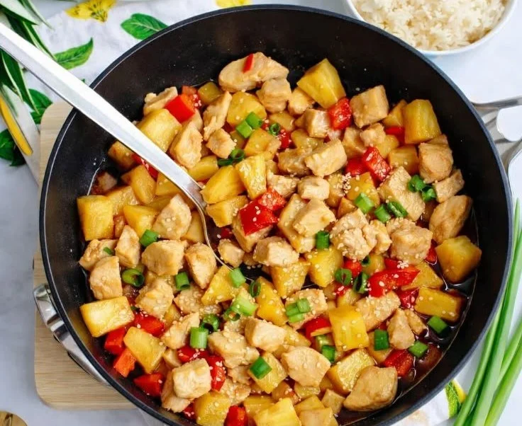 Delicious Pineapple Chicken and Rice Skillet for a quick weeknight dinner.