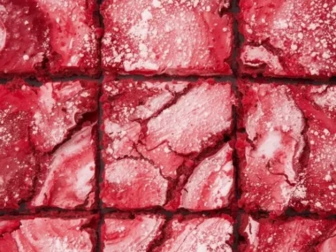 Delicious Red Velvet Cheesecake Brownies with creamy cheesecake swirl on top