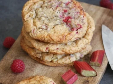 Homemade rhubarb raspberry cookies on a baking tray ready to serve.