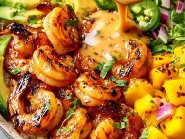 Shrimp avocado bowls with mango salsa and lime-chili sauce.